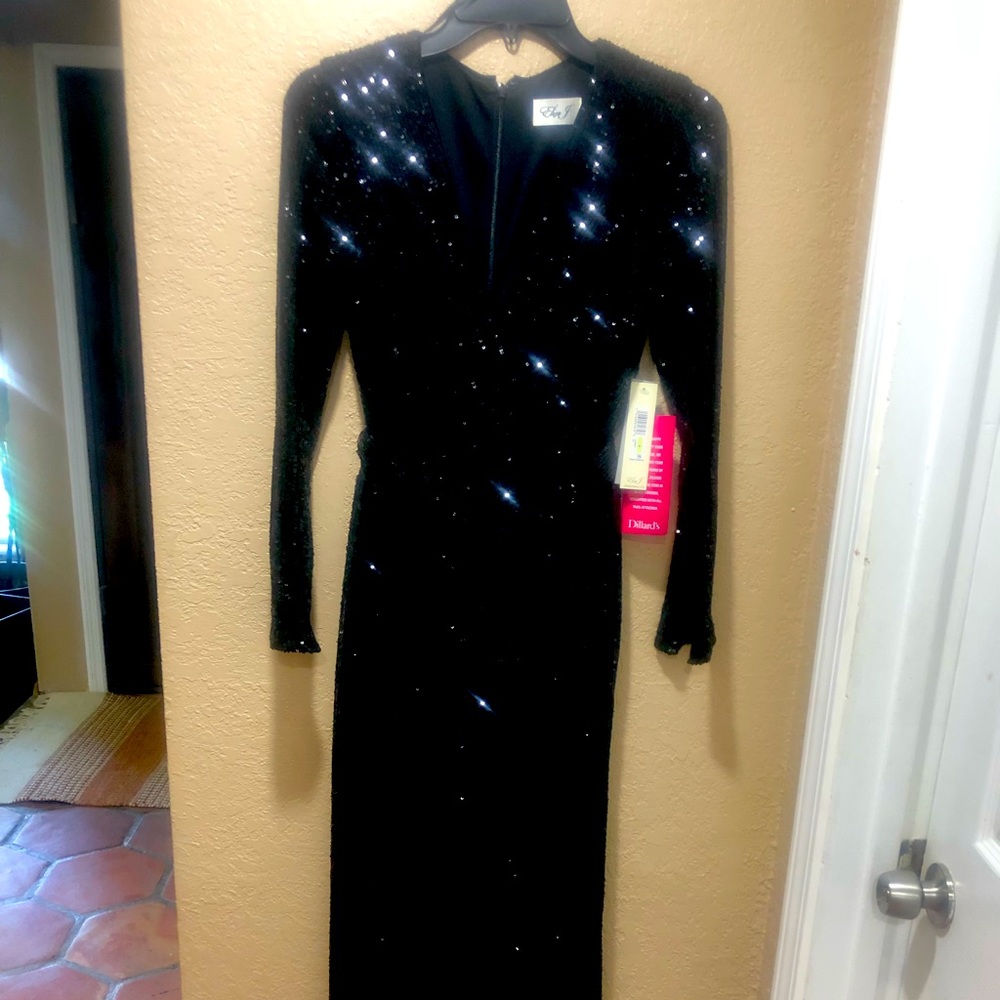 Black sequin jumper .